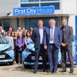 stephen-trowbridge-keith-trowbridge-and-david-trowbridge-with-first-city-employees-outside-their-new-headquarters-first-city-house
