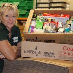 Cher Smith of Swindon Foodbank with GWP Packaging donated boxes