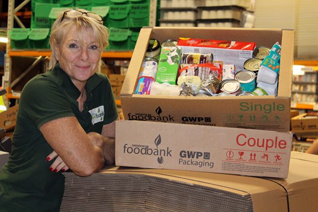 Cher Smith of Swindon Foodbank with GWP Packaging donated boxes