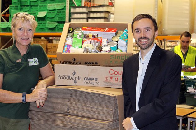Cher Smith, Manager of Swindon Foodbank, with GWP Packaging Marketing Manager Matt Dobson