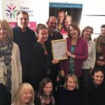 Pictured are some of the CSW team proudly showing their PQASSO certificate