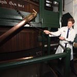 The Duchess of Cornwall swinging the valentine with Head Brewer Alex Arkell