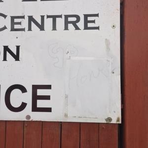 Graffiti written on sign at Punjabi Community Centre