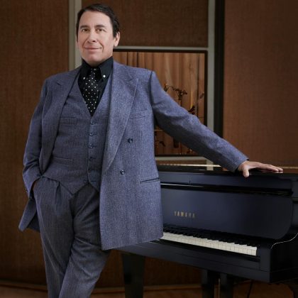 Jools-Holland-standing-at-the-piano---photo-by-Mary-McCartney