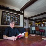 Reverend Patricia Robinson in the Ye Old 3 pub.