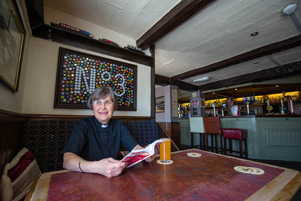 Reverend Patricia Robinson in the Ye Old 3 pub.