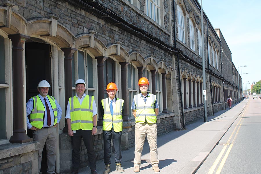 Cllr Dale Heenan, Dr Geraint Coles and Marc Bayley inside the ground floor of Unit 11 of the Carriage Works