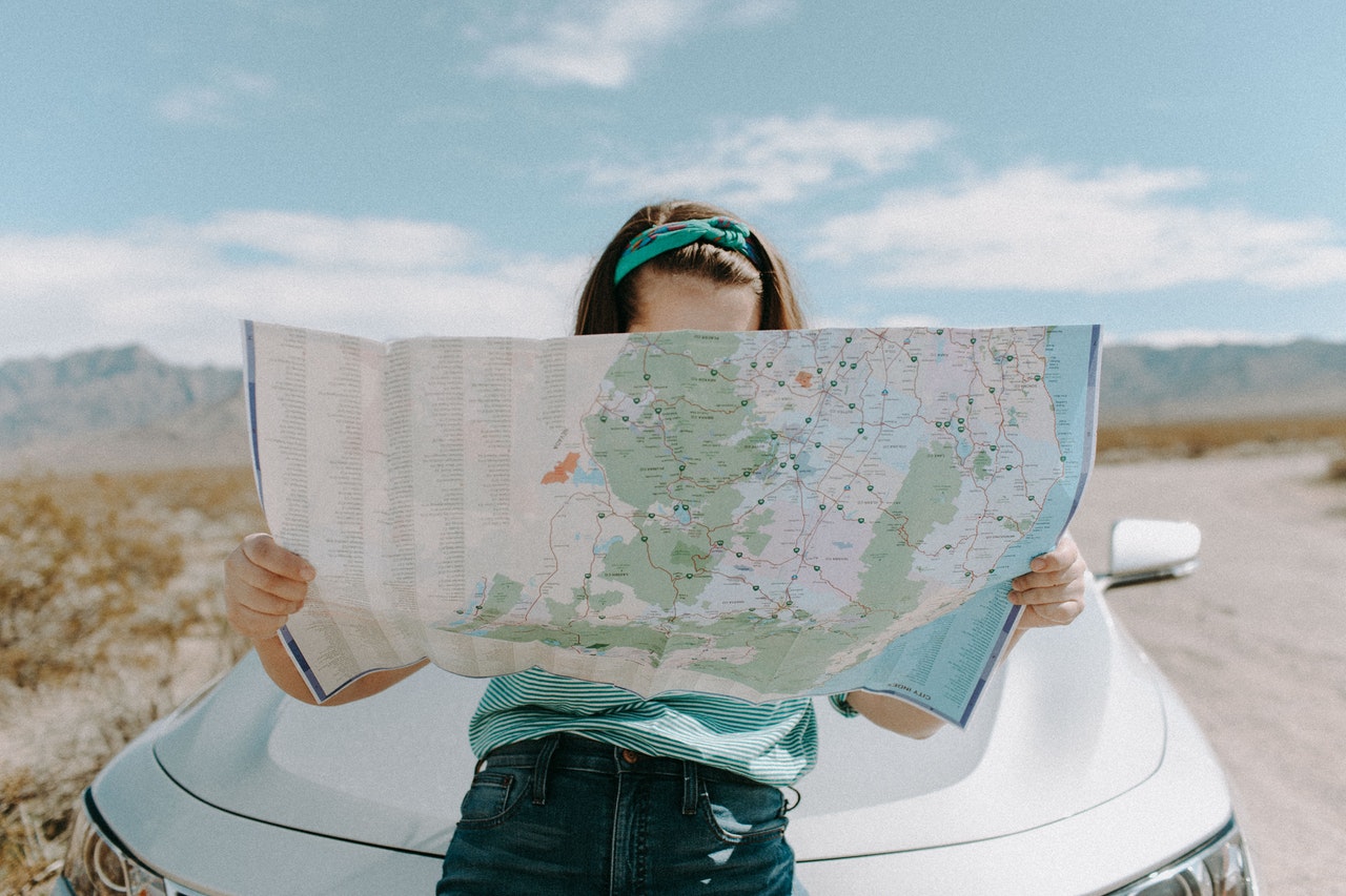 traveller reading a map