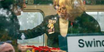 Queen Camilla arrives in Swindon aboard GWR’s largest-ever Poppy Train