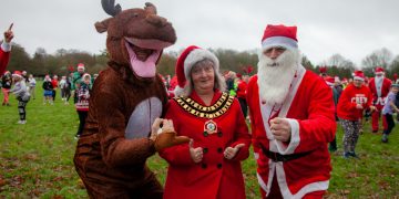 Rain fails to stop Santa vs Rudolph charity run at Lydiard Park