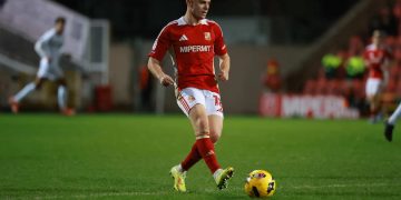 Swindon Town rebuild pays off as Robins mount promotion bid