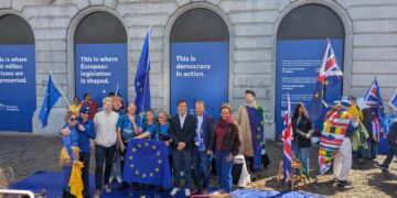 Swindon dancers Steve Rouse and Marisa Zoeller celebrate outside the European Parliament in Brussels after completing a 360km walk from Westminster as part of the Rejoin Ramble.