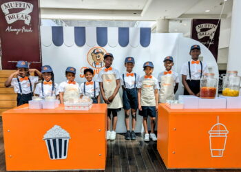 Young entrepreneurs sell sweets in town centre pop-up