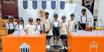 Young entrepreneurs sell sweets in town centre pop-up