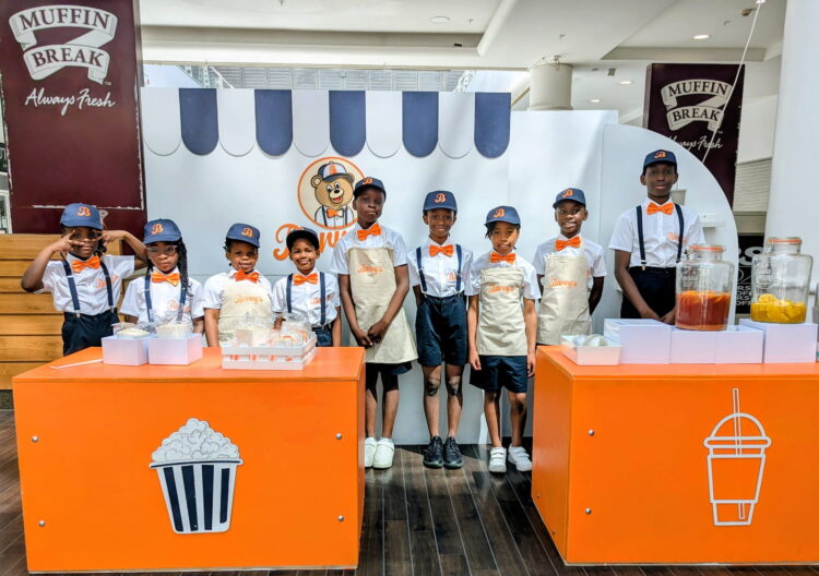 Young entrepreneurs sell sweets in town centre pop-up
