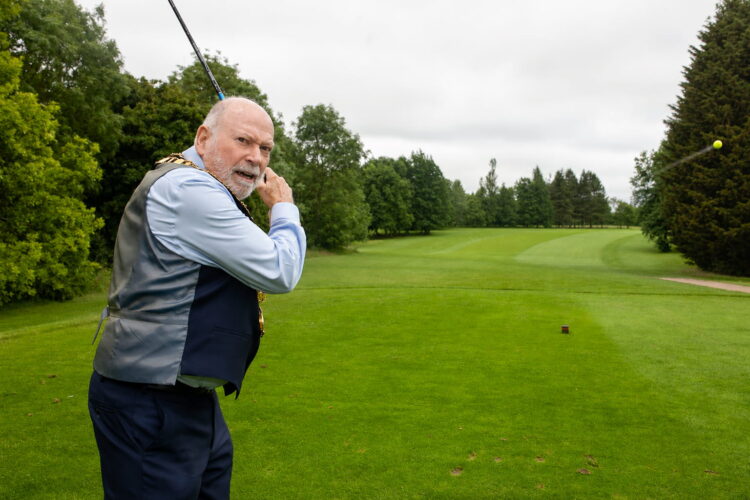 Mayor’s drive heads straight for the trees, again, at charity golf day