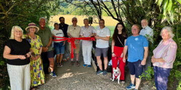 Burned down, rebuilt by volunteers, refurbished, now officially reopened: The remarkable story of Seven Fields’ King Bridge