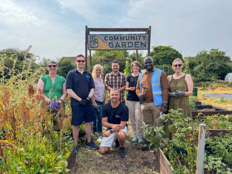 Councillors get hands dirty helping Ukrainian community garden flourish