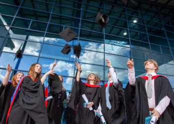 GALLERY: Paralympic champion shares his toughest battle at New College Swindon graduation