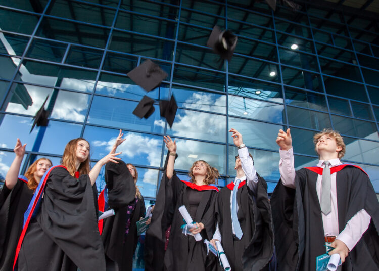 GALLERY: Paralympic champion shares his toughest battle at New College Swindon graduation